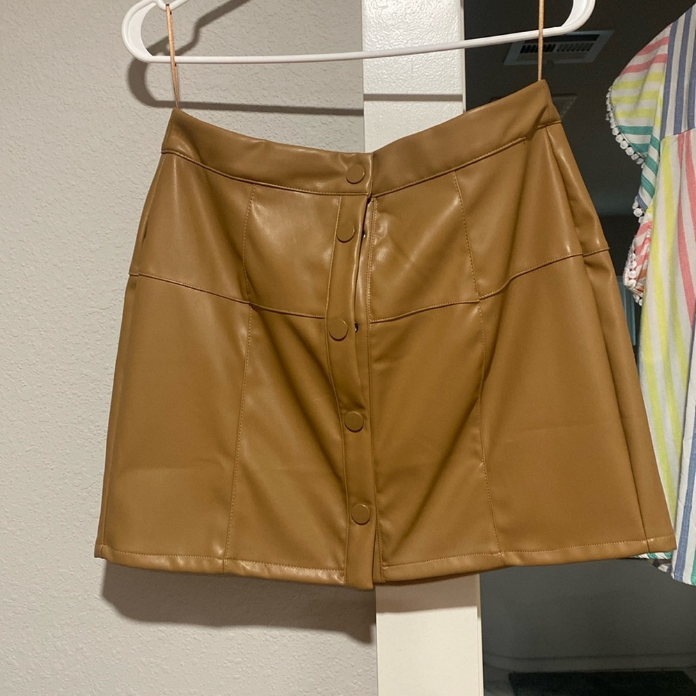 Fax brown leather skirt. Buttons up